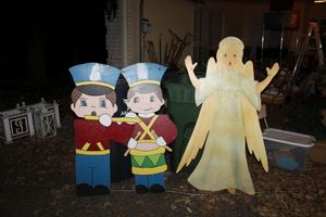 lot 552 image: Christmas wooden signs angel, drummer boy and flute player