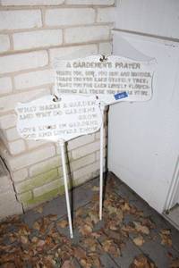 lot 676 image: Cast iron garden signs