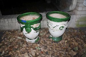 lot 677 image: Pair of green glazed planters