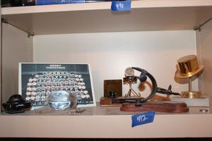 lot 492 image: Trophy awards and crystal NFL football with Cowboys Christmas card