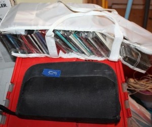 lot 529 image: CDs and CD travel case