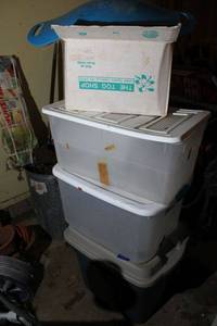 lot 557 image: Plastic storage totes and Misc. items box