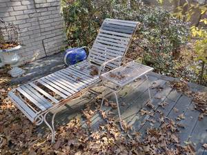 lot 659 image: Lounge chair with side table and cushion