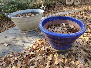 lot 658 image: Blue glazed planter and galvanized planter
