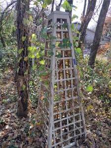 lot 688 image: Wooden obelisk trellis - about 6 ft. tall