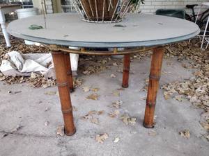 lot 625 image: Round glass top table with bamboo style legs (very heavy, bring help)