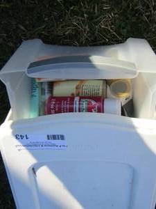 lot 143 image: one drawer white storage container full of used paints