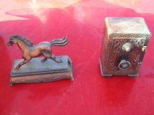 lot 114 image: 2 metal pencil sharpener- 1 horse- 1 safe
