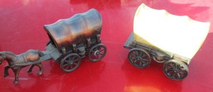 lot 116 image: horse and carriage metal pencil sharpener and a carriage sharpener