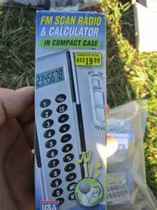 lot 75 image: FM scan radio and calculator in a compact case
