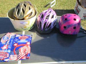 lot 251 image: kids bike helmets and glow sticks