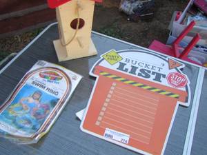 lot 274 image: misc. lot bucket list sign- new kids float- bird house
