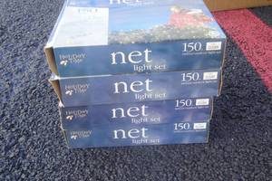 lot 7 image: 4 Boxes of Holiday Time Net Lights, Clear indooroutdoor. 150 count per box, 6x4