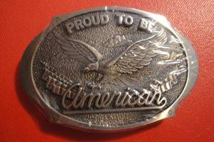 lot 55 image: Proud To Be American Eagle and Flags Belt Buckle, 3 34x 2 12, Solid Brass, Sealed in Plastic