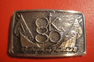 lot 61 image: US Olympic Festival OK89, Solid Brass Belt Buckle,3 34x2 No 204 Sealed in Plastic, Festival was held in OKC