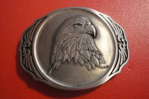 lot 67 image: Solid Brass Eagle Belt Buckle by Award Design Medals, 3 12x 2 12