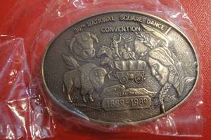 lot 70 image: 38th National Square Dance Convention Belt Buckle, 3 12x 2 12, Run to Oklahoma 1889-1889, Sealed in Plastic