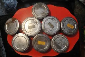 lot 29 image: 8 Vintage Kodak Film Cannisters, 2 With Film on Spool, 5 With Empty Spools, 1 Empty