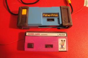 lot 86 image: 2 Vintage Kodak Childrens Cameras, Mickey-Matic and Fisher Price