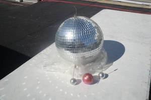 lot 139 image: 1- 12 Mirrored Disco Ball and 3- Small Disco Balls
