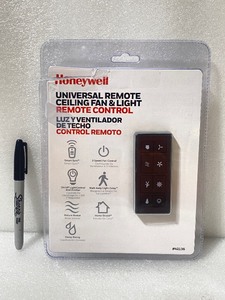 lot 4 image: Honeywell Universal Remote Ceiling Fan & Light Remote Control - In Condition As Shown