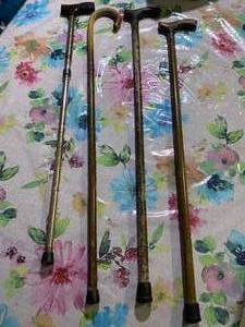 lot 217 image: Lot Of 4 - Walking Canes - In Condition As Shown