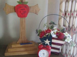 lot 56 image: red alarm clock, wooden cross with verse PS. 178,  STAR handled BASKET  American flag with wax flowers