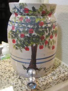 lot 28 image: Pottery CROCK W SPIGOT AND LID Apple family tree