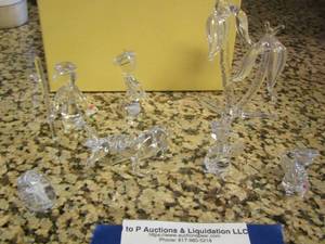 lot 100 image: clear glass mini Christmas figurines