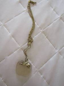 lot 125 image: Avon gold necklace with apple pendant