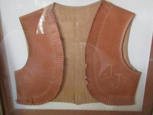 lot 115 image: handmade baby leather vest framed with initials jj
