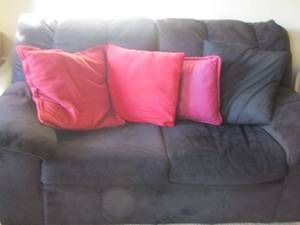 lot 117 image: Ashley furniture couch with various throw pillows