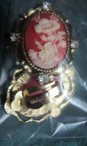 lot 13 image: White Flower on Coral base clip on earrings