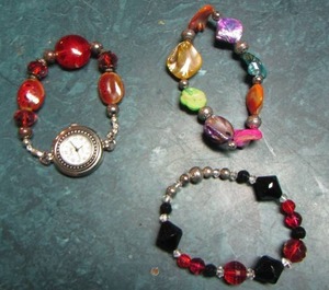 lot 222 image: swap womens watch, 2 womens bracelets