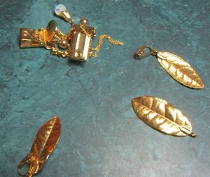 lot 207 image: gold color clip on earrings, gold necklace