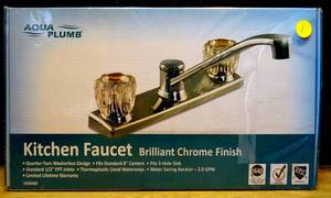 lot 1 image: NEWSEALED - Aqua Plumb 1550400 8-Inch Two-Handle Polished Chrome Kitchen Faucet