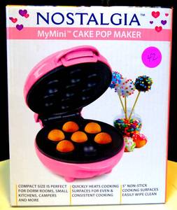 lot 42 image: NEWSEALED - Nostalgia MyMini Cake Pop Maker Electric Hot Pink