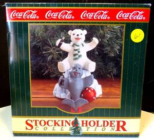 lot 61 image: COCA COLA STOCKING HOLDER - POLAR BEAR CUB WITH SEAL (1998)