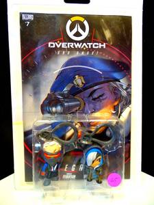 lot 165 image: OVERWATCH ANA AMARI & SOLDIER 76 COMIC BOOKS AND BACKPACK HANGER