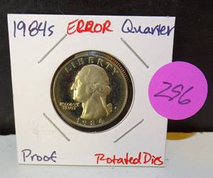 lot 296 image: PROOF ERROR - 1984 QUARTER WITH ROTATED DISC ERROR
