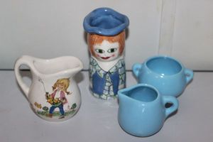 lot 45 image: Ceramic MEG Vase by Susan Paley Ganz, Vintage Creamer with Little Girl and her Ducklings, Blue ceramic sugar and creamer set