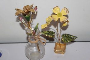 lot 54 image: Enamel Flowers