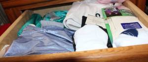lot 243 image: Womens Undergarments and Socks with TagsStill packaged Fur Vest