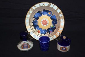 lot 31 image: Miniature Porcelain Empty Pussers Rum Decanter,  Pussers Rum Ceramic Decanter Royal Worcester 2000 AD
