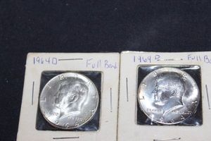 lot 30 image: Two 1964 D Half Dollar coins Full Bands