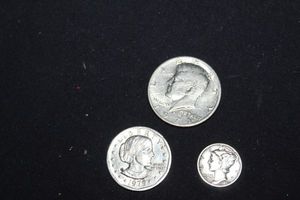 lot 79 image: Susan B Anthony Coin, Half Dollar and Mercury Dime