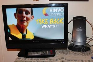 lot 92 image: Television with Antenna and Remote