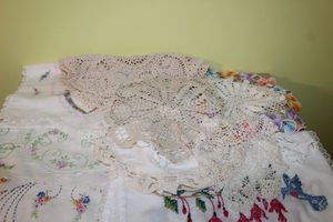 lot 115 image: Handmade dollies and table runners