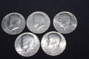 lot 130 image: Five -  Bicentennial Kennedy Half Dollars
