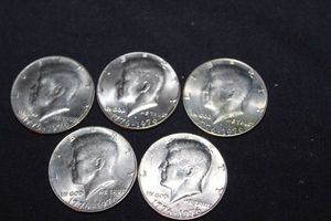 lot 131 image: Five -  Bicentennial Kennedy Half Dollars